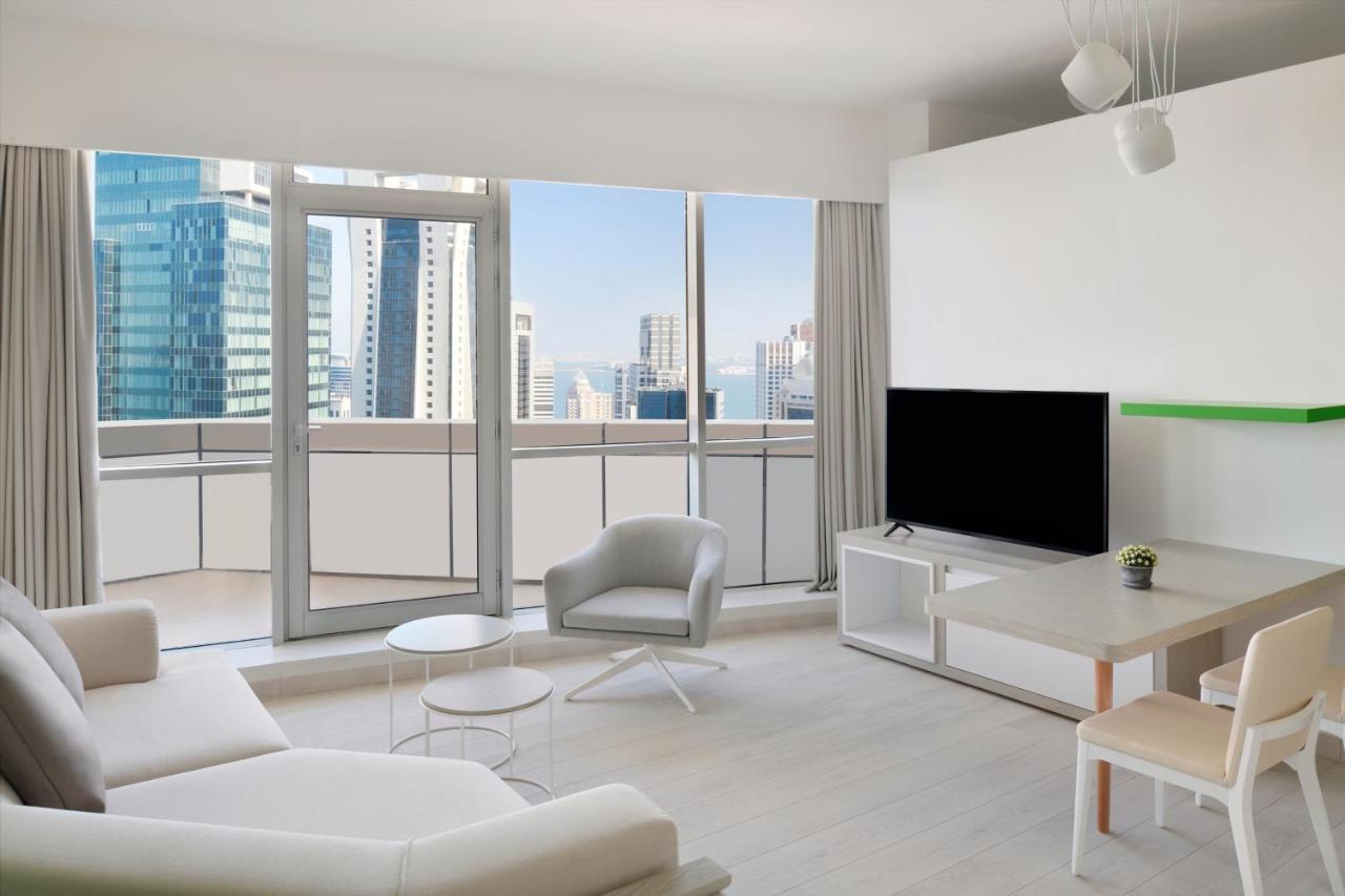 Element By Westin West Bay Doha Hotel Exterior foto A living room in a condominium